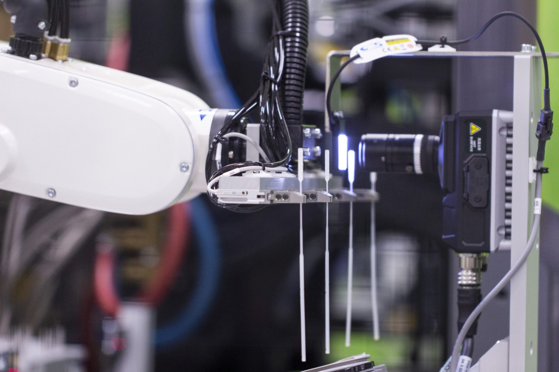 A medical device being inspected by machine vision